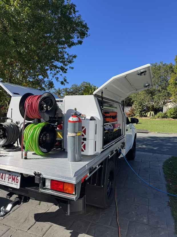 Loaded Got A Leak ute — hose reels and tracer gas
