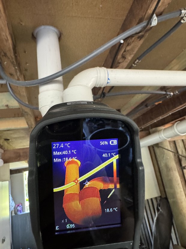 Thermal camera showing a hot water pipe under the floor