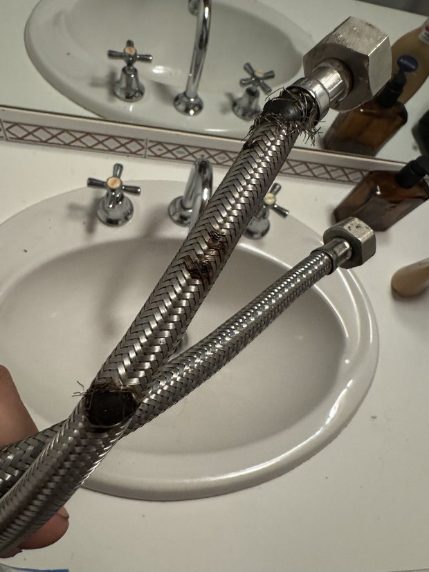 Failed flexi hose found under a basin
