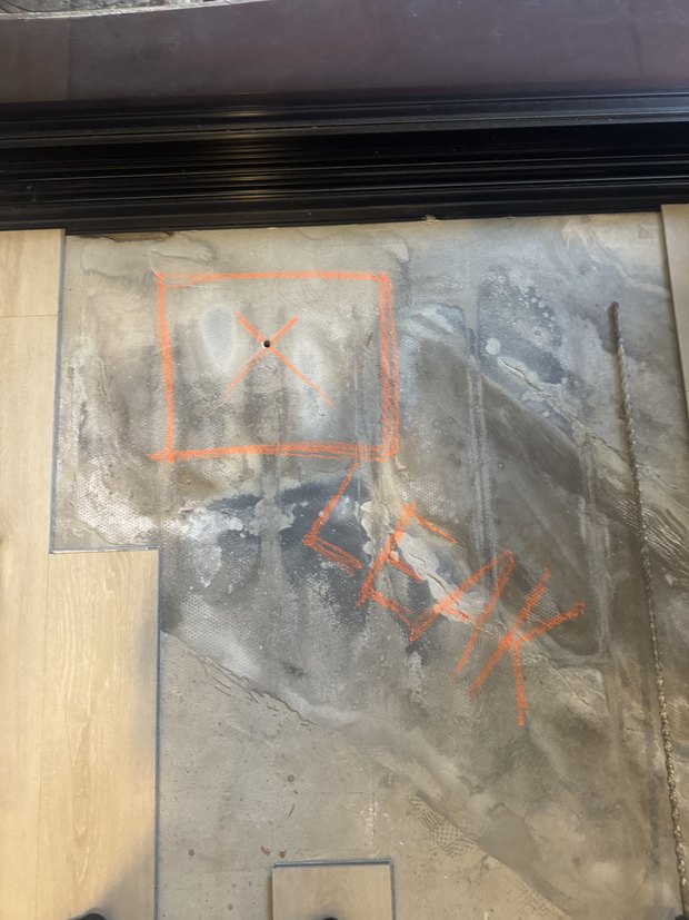 Leak pinpointed and marked up on a slab