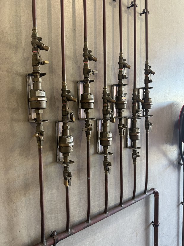 Bank of water meters on a commercial site