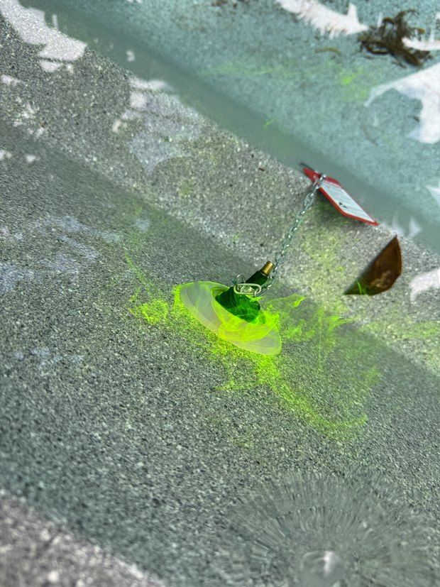 Dye test at a pool wall fitting