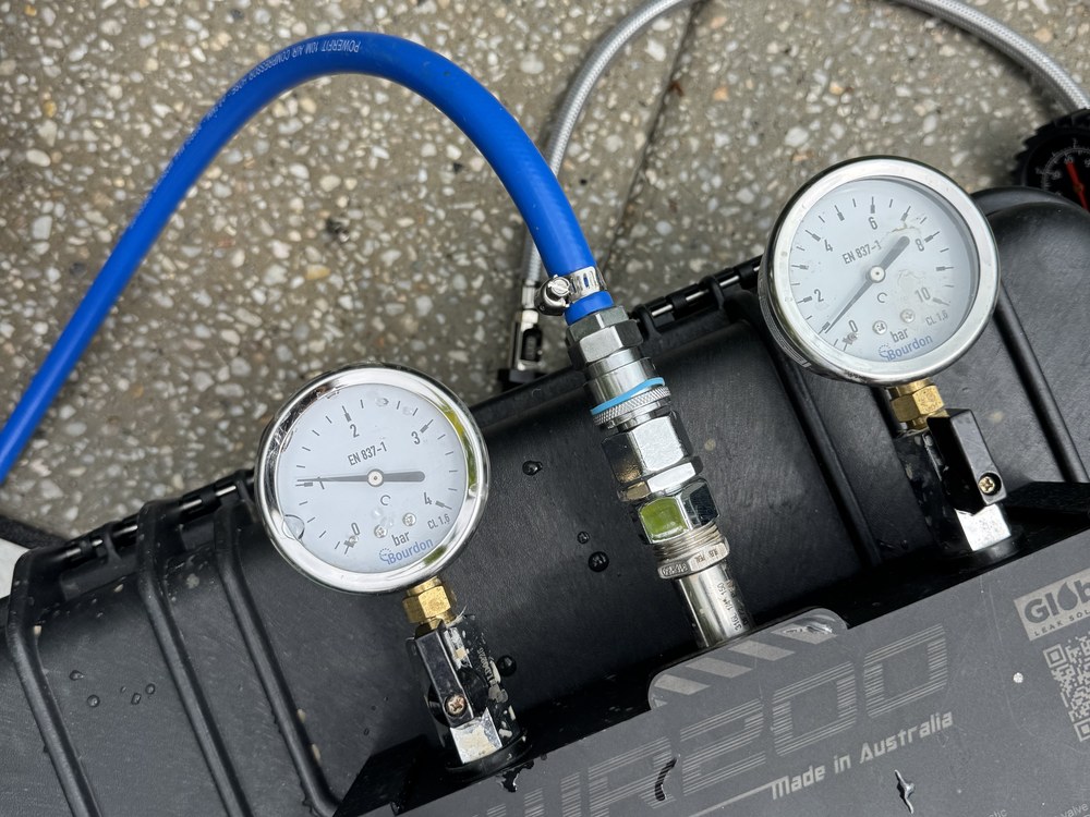 Pressure gauges used to test pool plumbing pipework