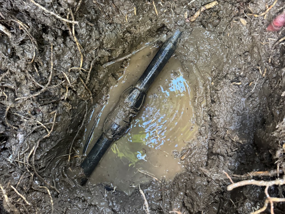 Underground pipe repair after a leak was located